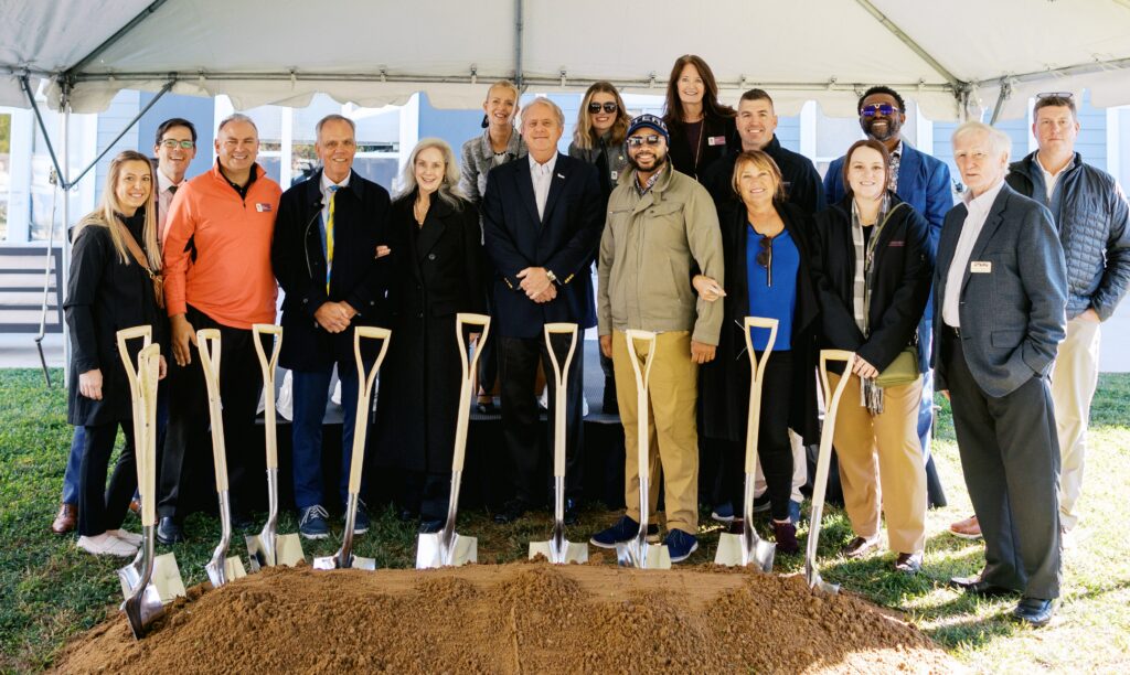 Cinnaire staff with shovels at a groundbreaking for Andy's Place